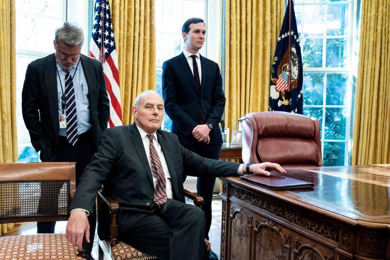White House communications director Bill Shine (L), White House Chief of Staff John Kelly (C), and Senior Advisor Jared Kushner in the Oval Office of the White House, December 11