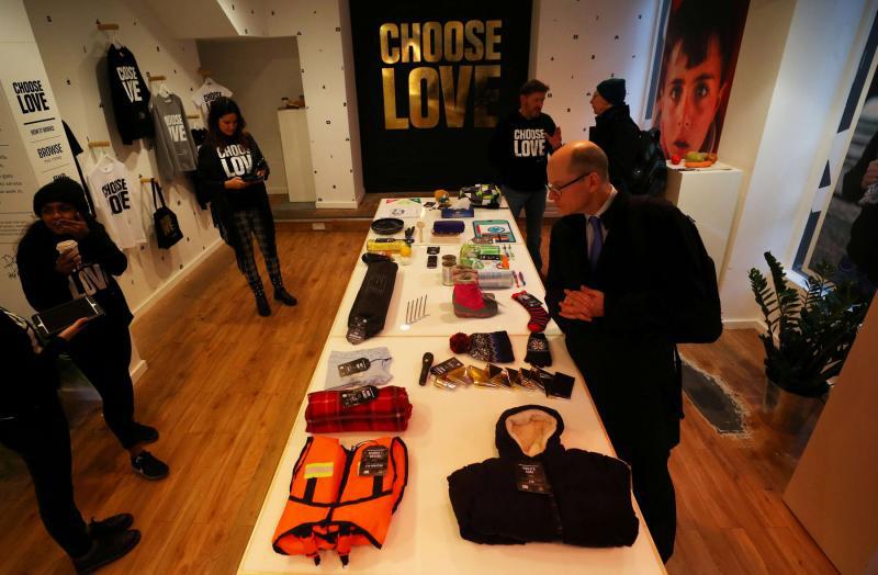 Customers looks at items for sale at the pop-up shop in London