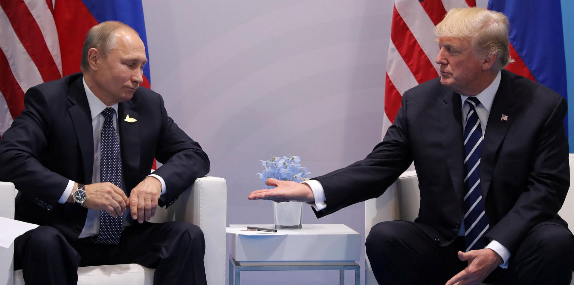 الرئيسان الأميركي دونالد ترامب والروسي فلاديمير بوتين في أول لقاء بينهما في يوليو الماضي