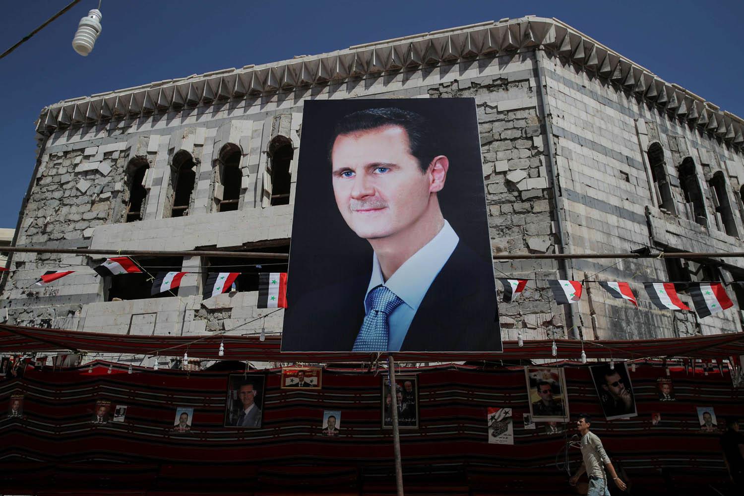 صورة للرئيس السوري بشار الأسد وسط دمشق