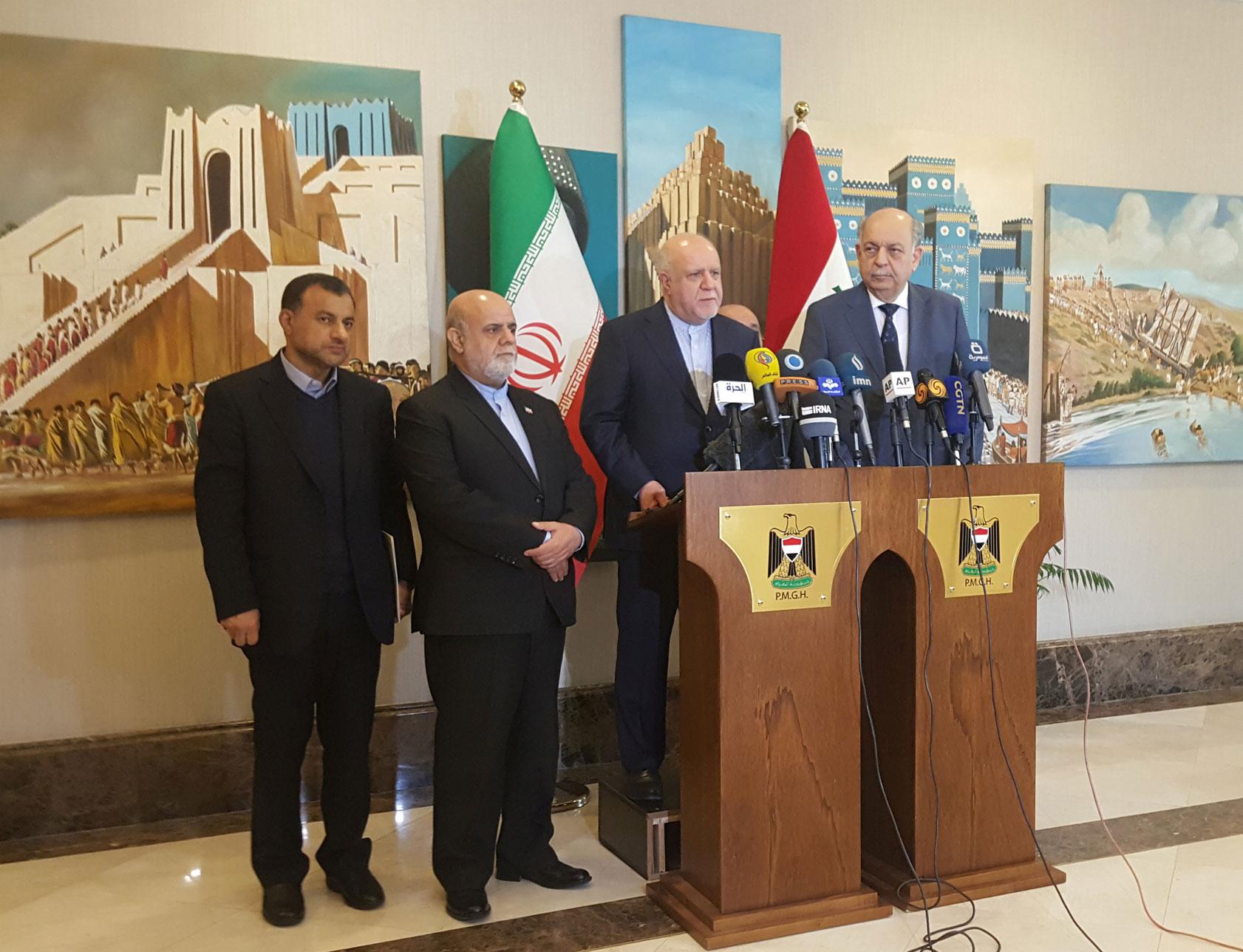 وزير النفط الإيراني بيغن زنغنه ووزير النفط العراقي ثامر الغضبان 