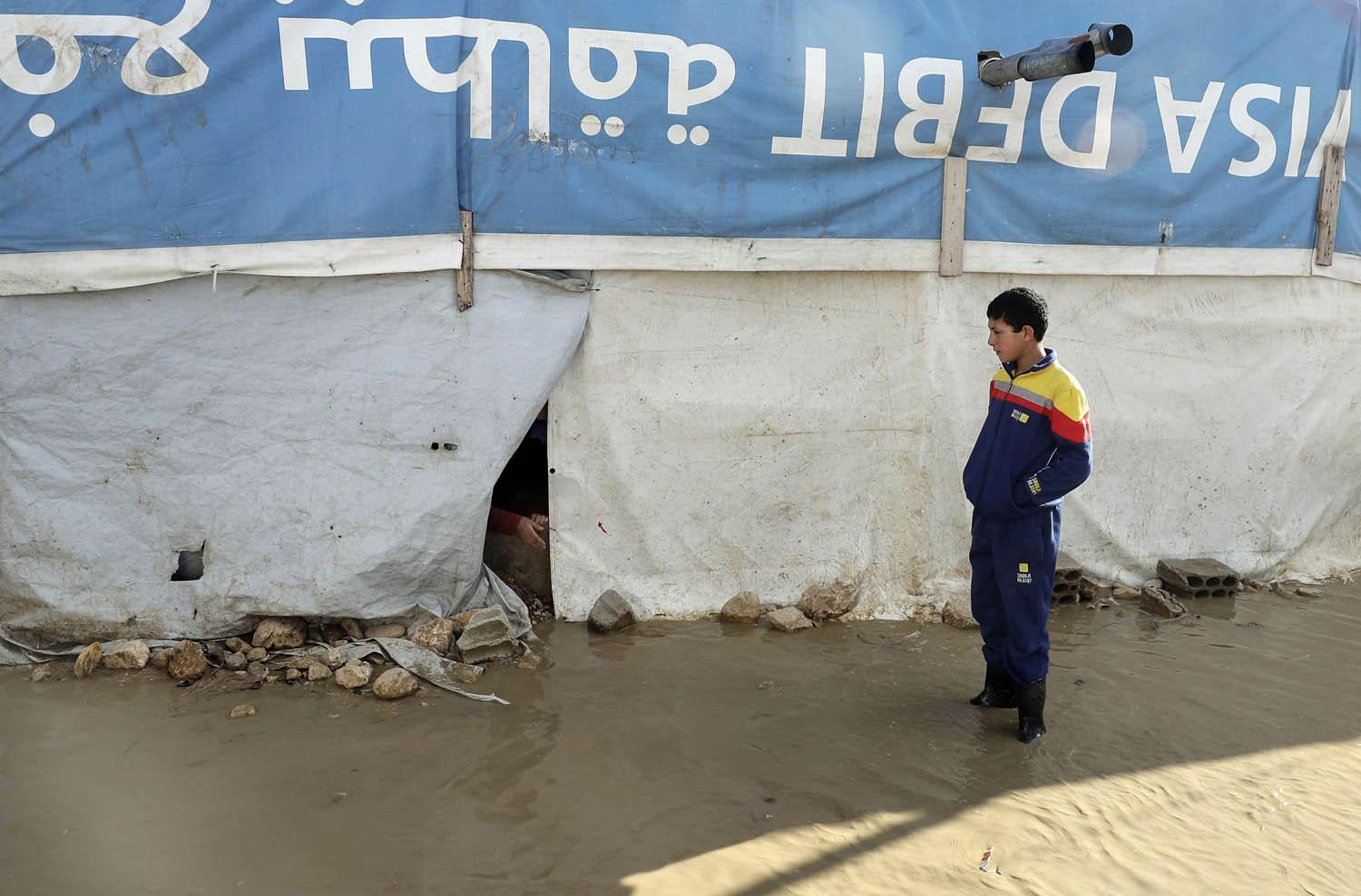 طفل سوري في مخيم للاجئين في البقاع