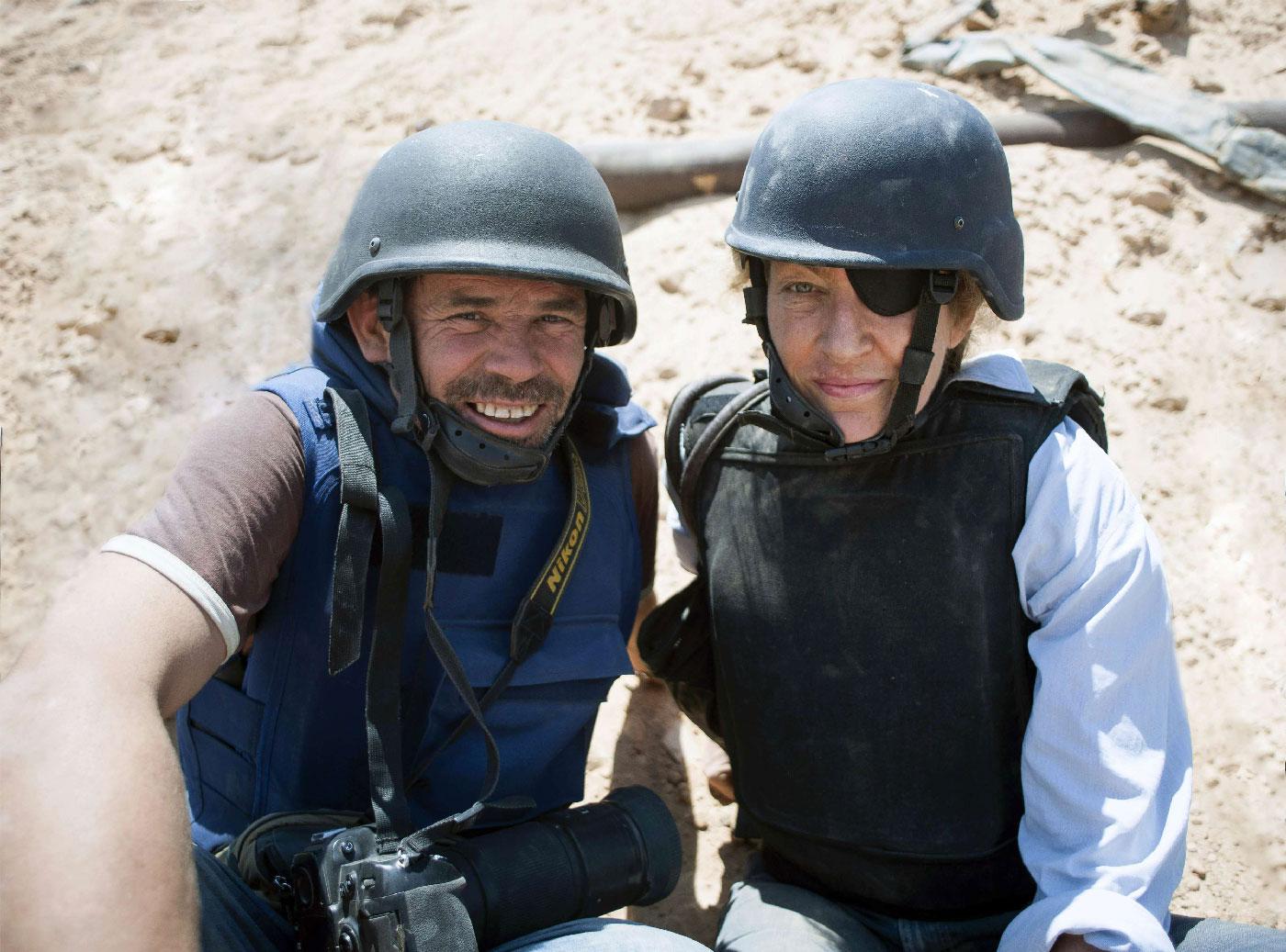 Photographer Paul Conroy, left, with war correspondent Marie Colvin in Misrata, Libya