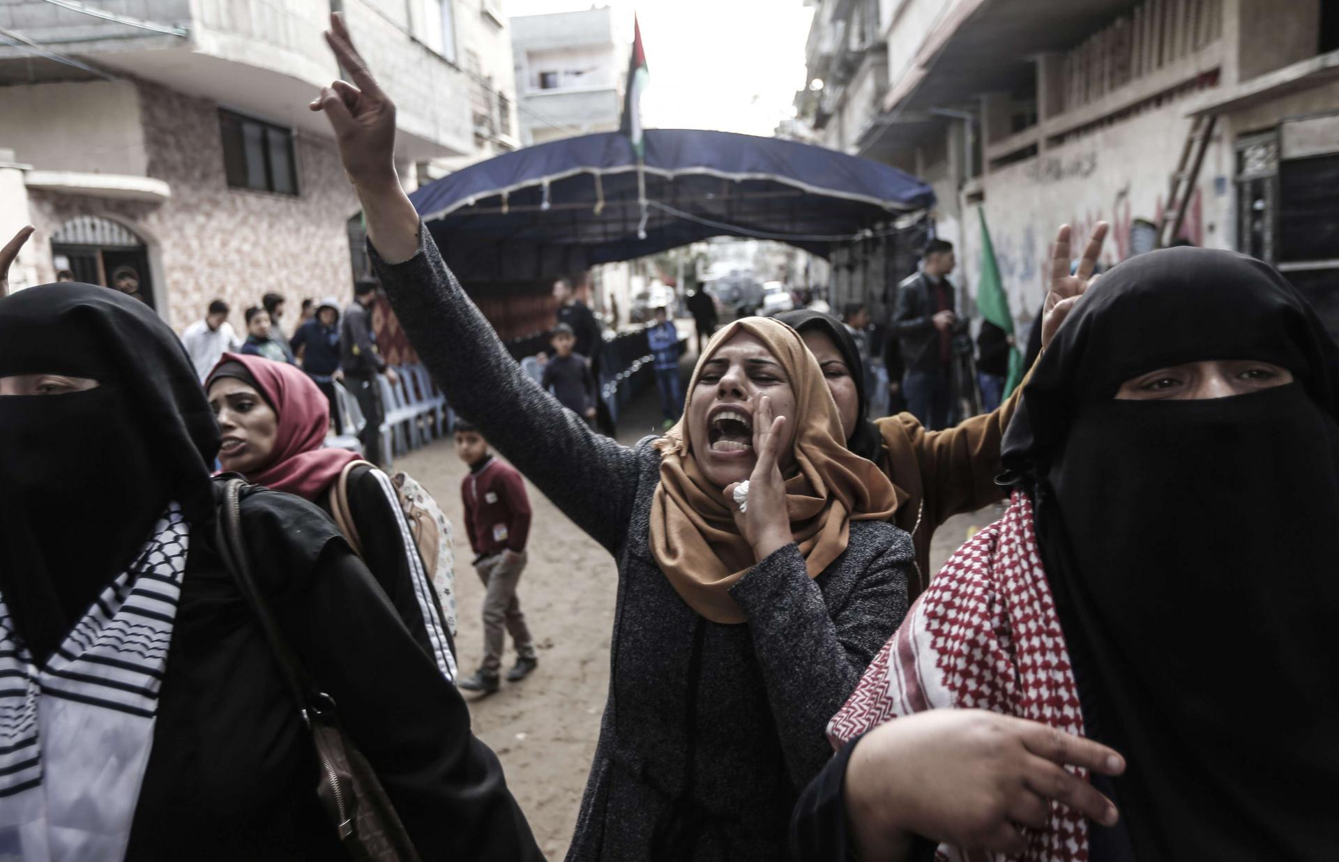 The clashes come a day after a Gaza woman was shot dead by Israeli forces during weekly protests