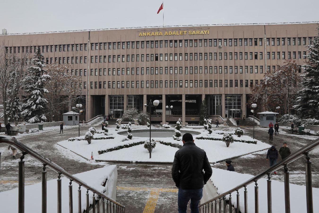 A man walks towards a court in Ankara, Turkey, on Tuesday, Jan. 8, 2019.