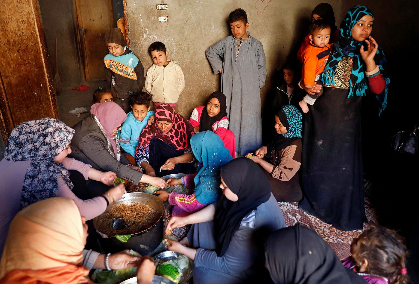 An Egyptian family prepares a cabbage meal for lunch in the province of Fayoum, southwest of Cairo, Egypt February 19, 2019.