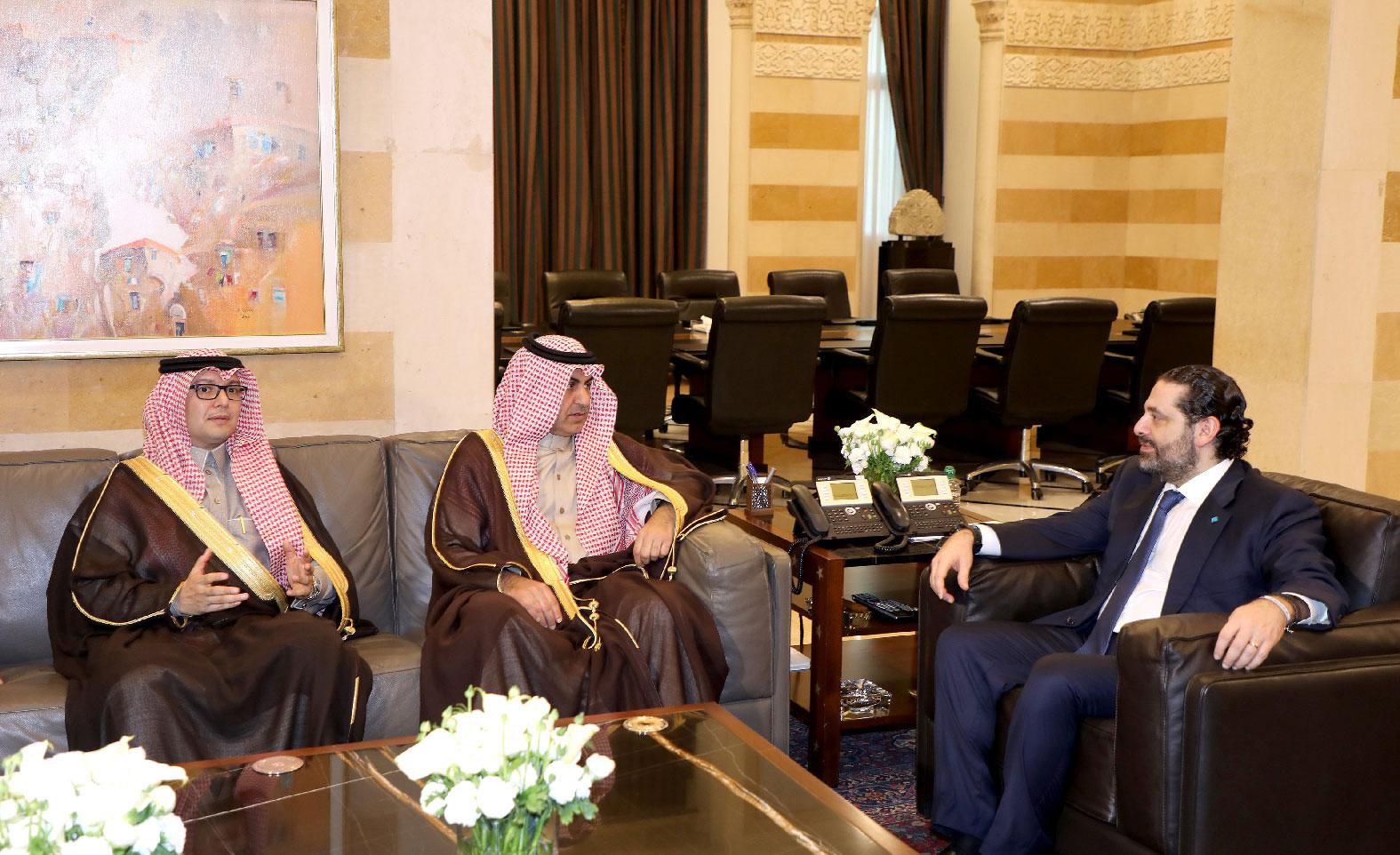 Lebanon's Prime Minister Saad al-Hariri meets with Nizar al-Aloula, visiting Saudi envoy and Saudi Ambassador to Lebanon Walid bin Abdullah Bukhari at the governmental palace in Beirut, Lebanon February 13, 2019.