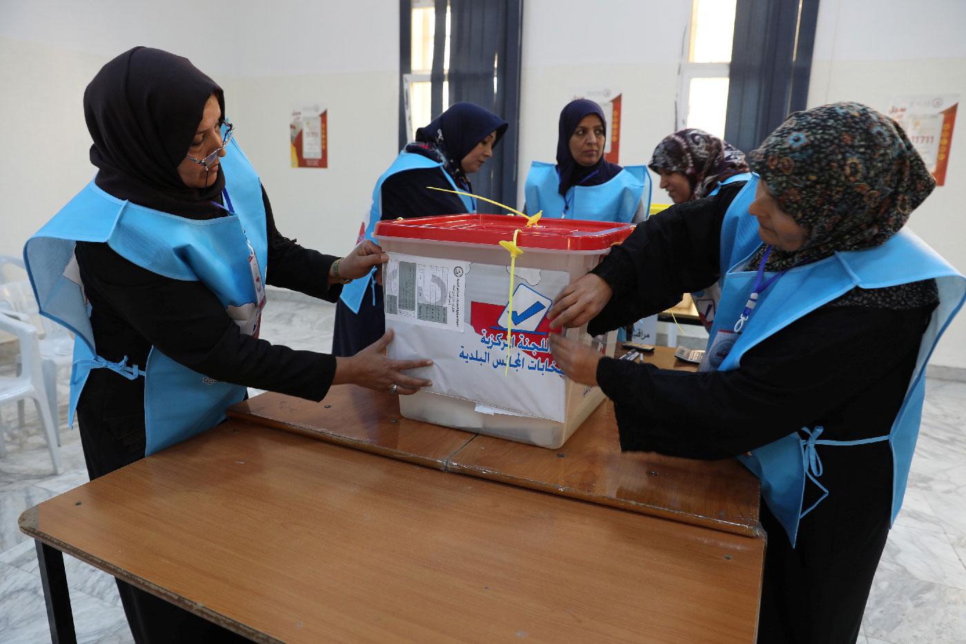 A group of members of the Central Committee for Municipal Elections are seen during an election simulation in local school, Tripoli, Libya February 3, 2019.