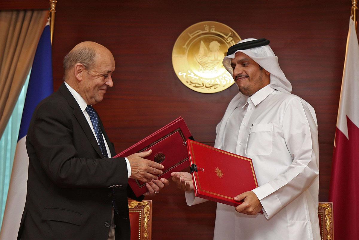 Qatari FM exchanges signed agreements with his French counterpart 