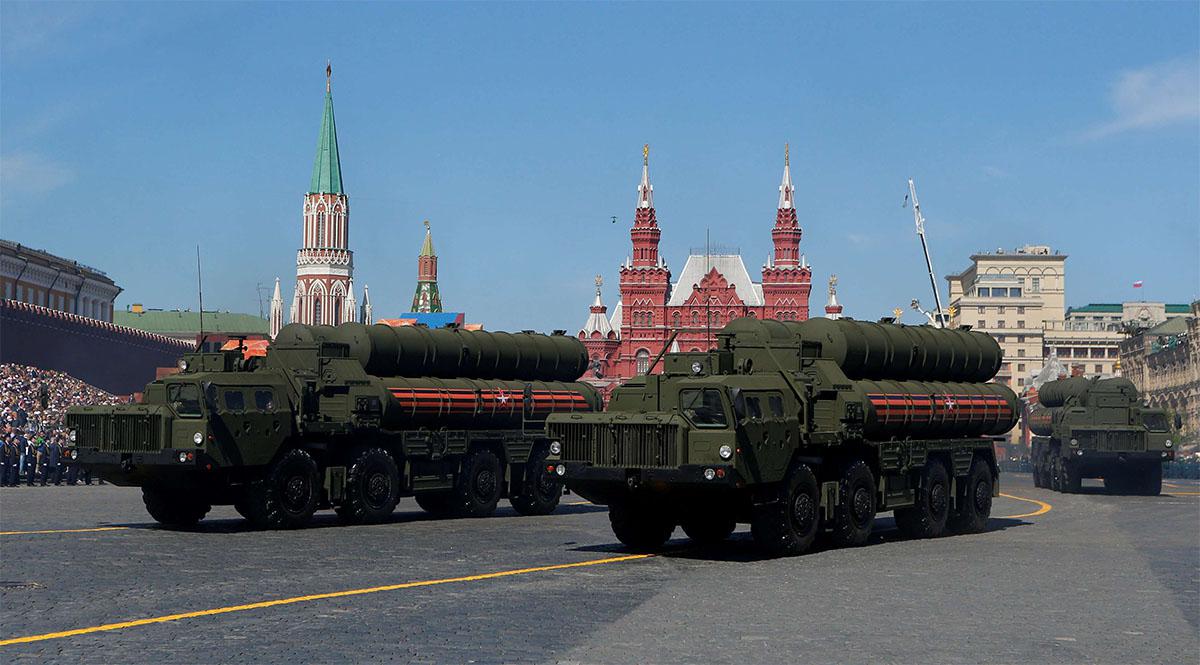 Russian servicemen drive S-400 missile air defence systems during ceremonies in Red Square