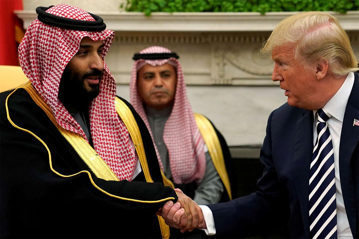 US President Donald Trump shakes hands with Saudi Crown Prince Mohammed bin Salman