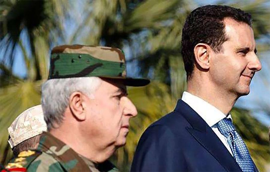 Syria's defence minister Ali Ayyoub with Bashar al Assad