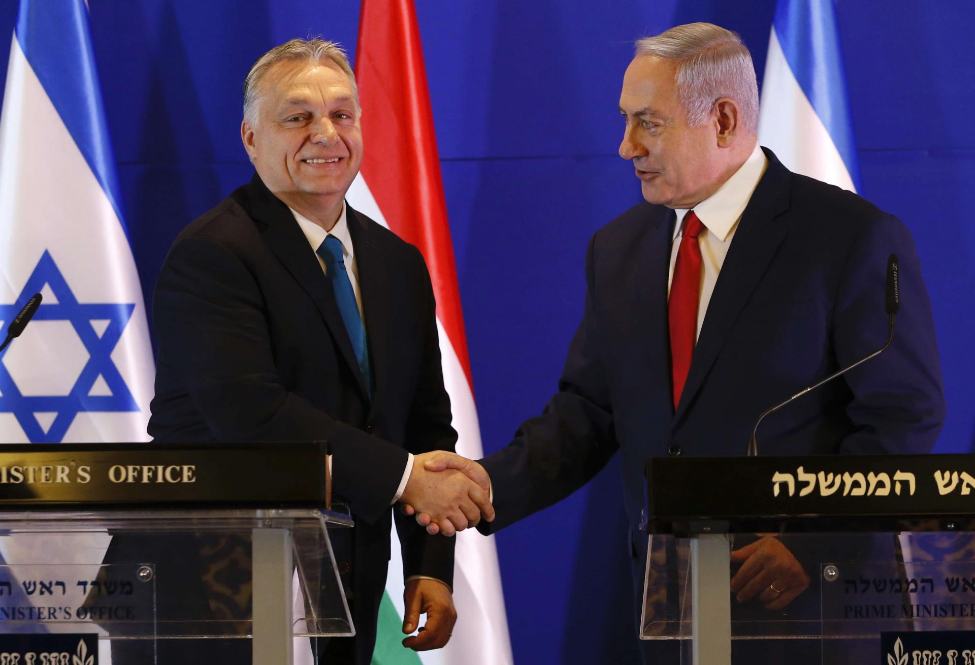 Hungarian Prime Minister Viktor Orban (L) and Israeli Prime Minister Benjamin Netanyahu shake hands during a press conference after their meeting in Jerusalem on February 19, 2019.