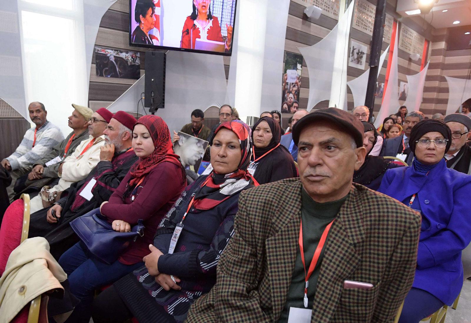 Relatives of Tunisian victims attend the closing conference of the Truth and Dignity Commission (TDC) in the capital Tunis on December 14, 2018.