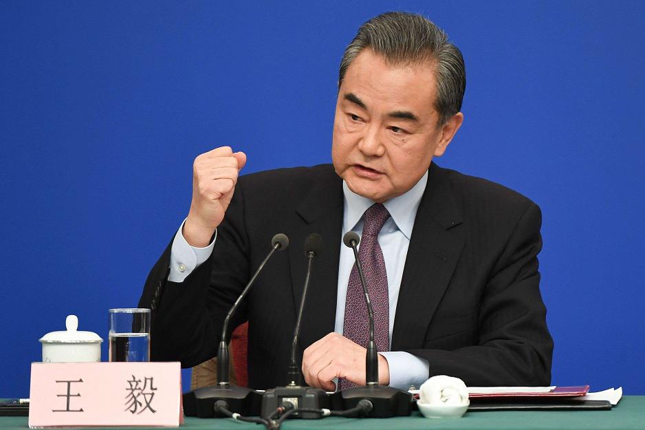 وزير الخارجية الصيني وانغ يي خلال مؤتمر صحفي في بكين