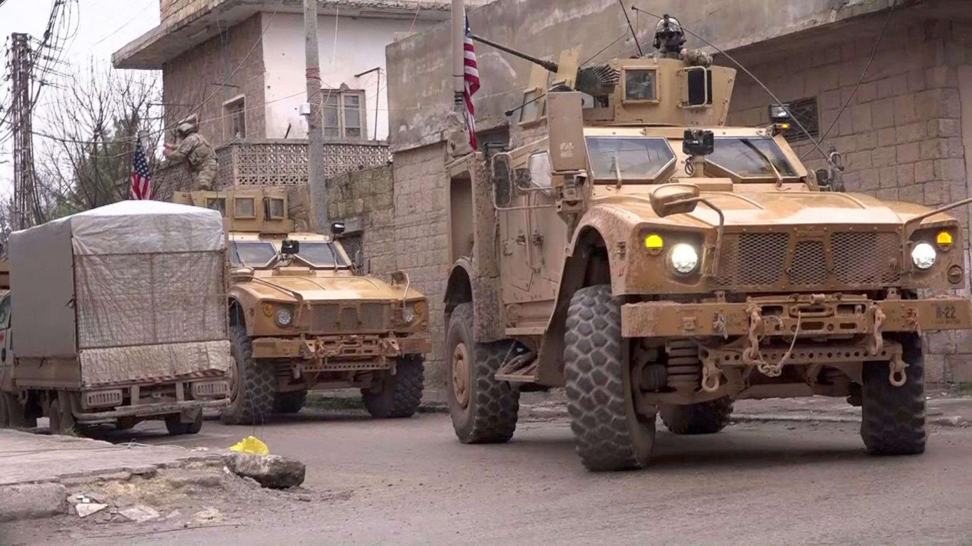 US armoured vehicles are pictured in the northern Syrian town of Manbij.