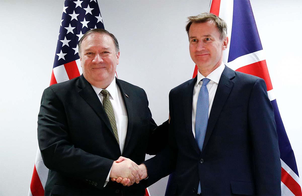US Secretary of State Mike Pompeo (L) shakes hands with Britain's Foreign Secretary Jeremy Hunt 