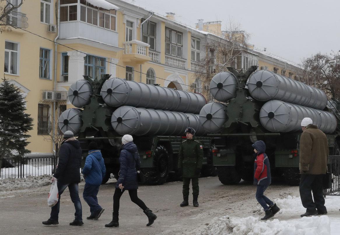 People walk past Russian S-400 missile air defence systems in city of Volgograd, Russia