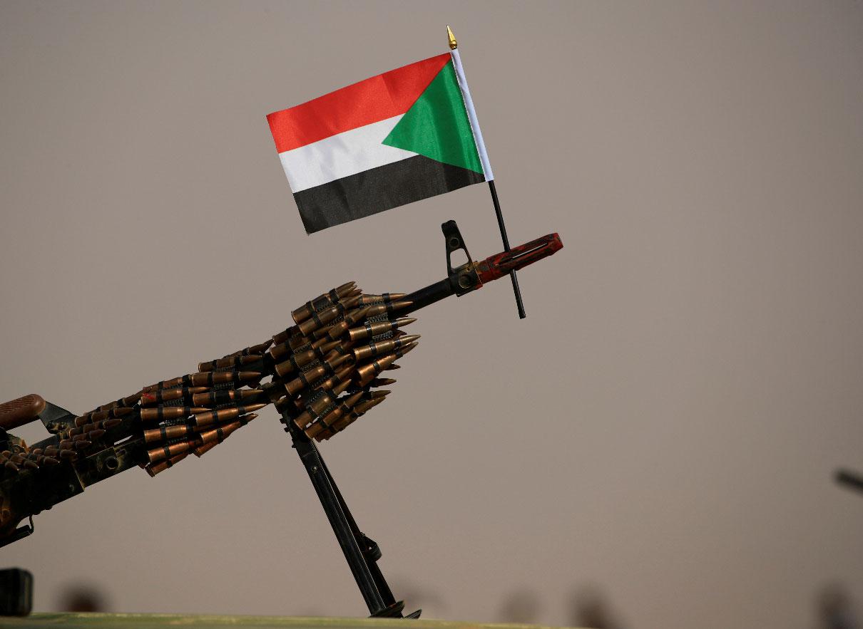 A Sudanese national flag is attached to a machine gun of Paramilitary Rapid Support Forces (RSF) soldiers
