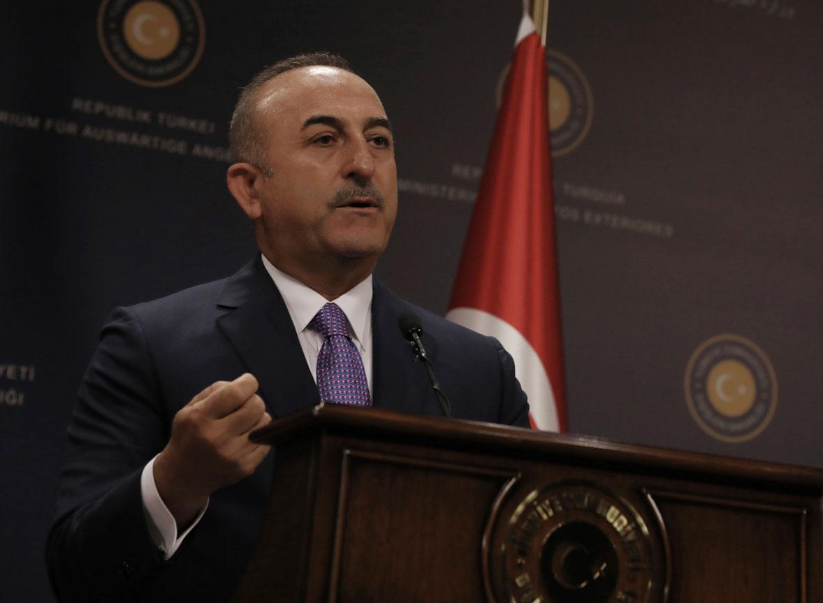 Turkey's Foreign Minister Mevlut Cavugoglu speaks during a news conference in Ankara