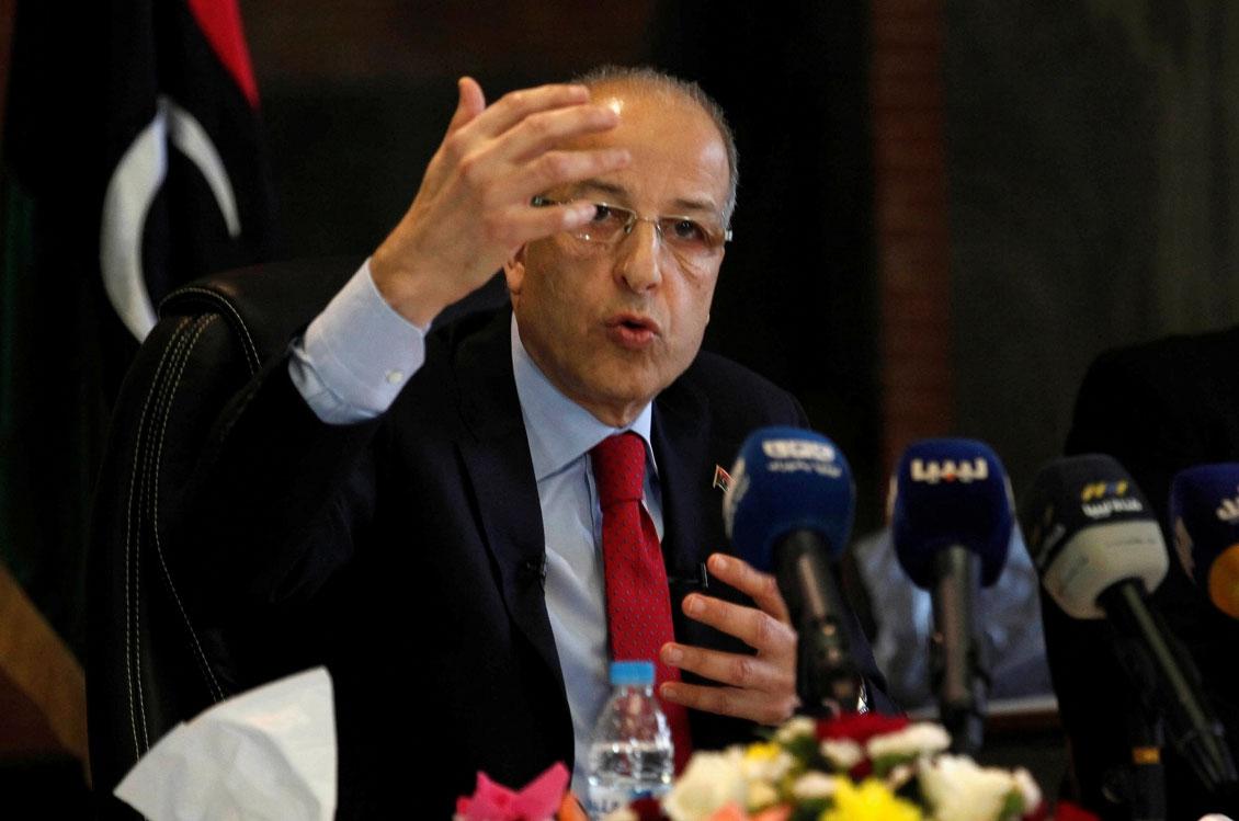 Central Bank of Libya director, Sadiq al-Kabir, gestures during a news conference in Tripoli