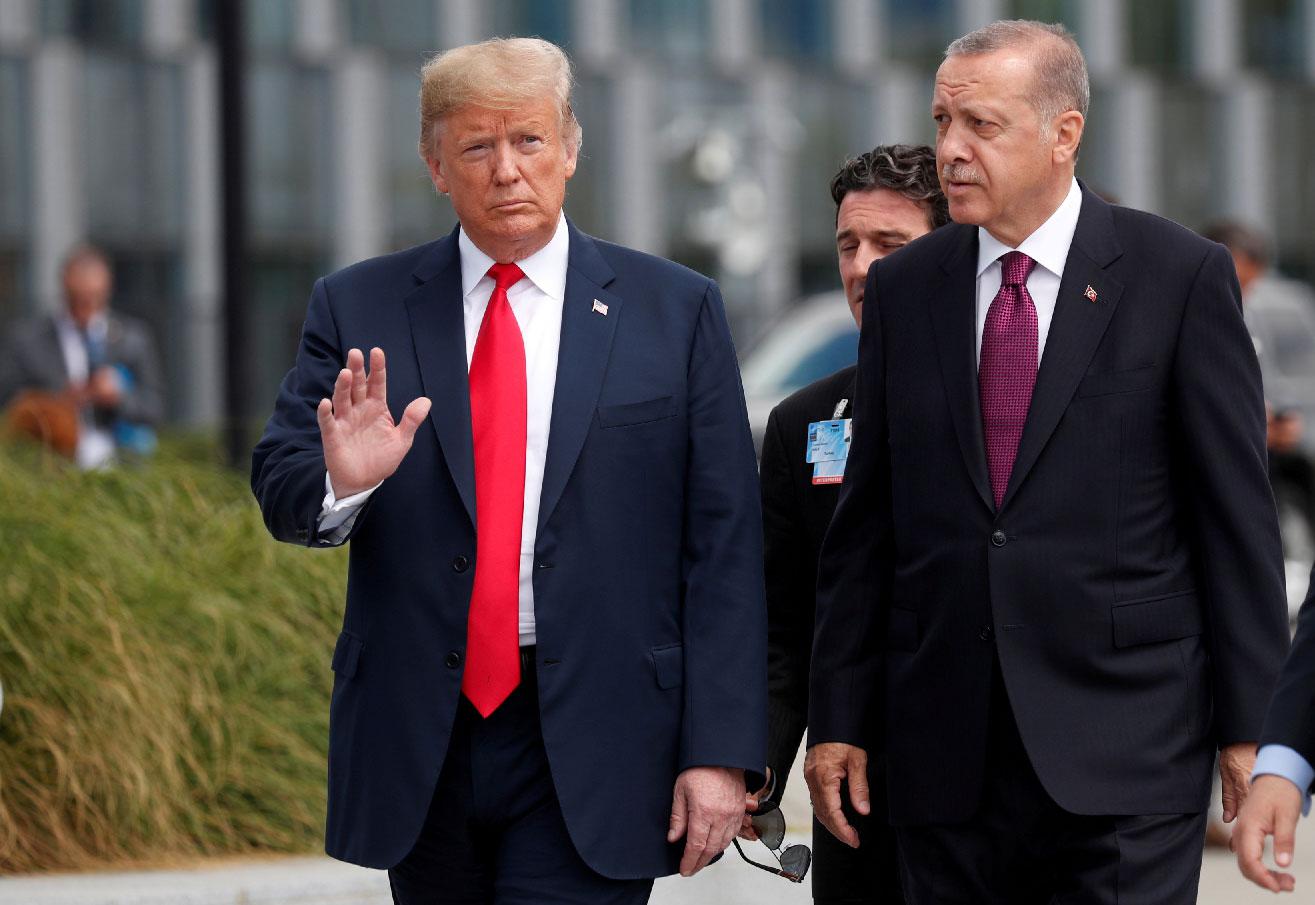 Turkish President Erdogan walks with US President Trump