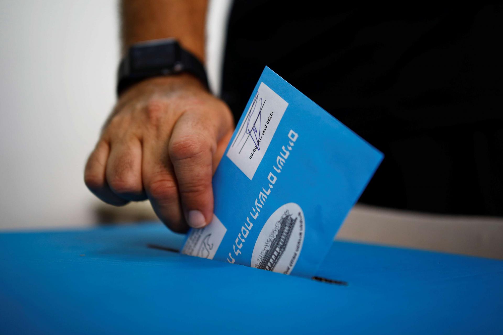 A man votes a poling station in Rosh Haayin, Israel