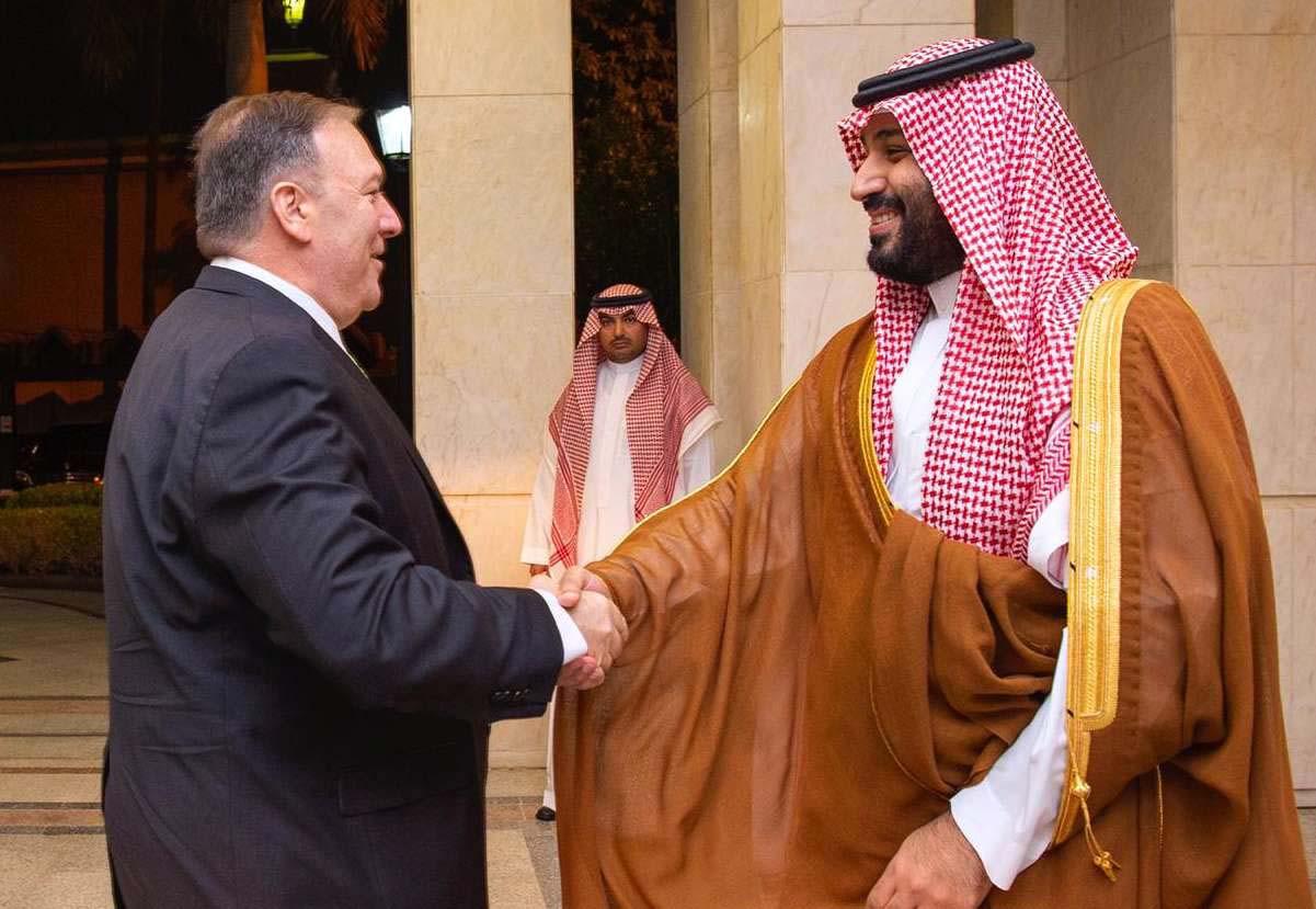 US Secretary of State Mike Pompeo (L) is greeted by Saudi Arabia's Crown Prince Mohammed bin Salman in Jeddah