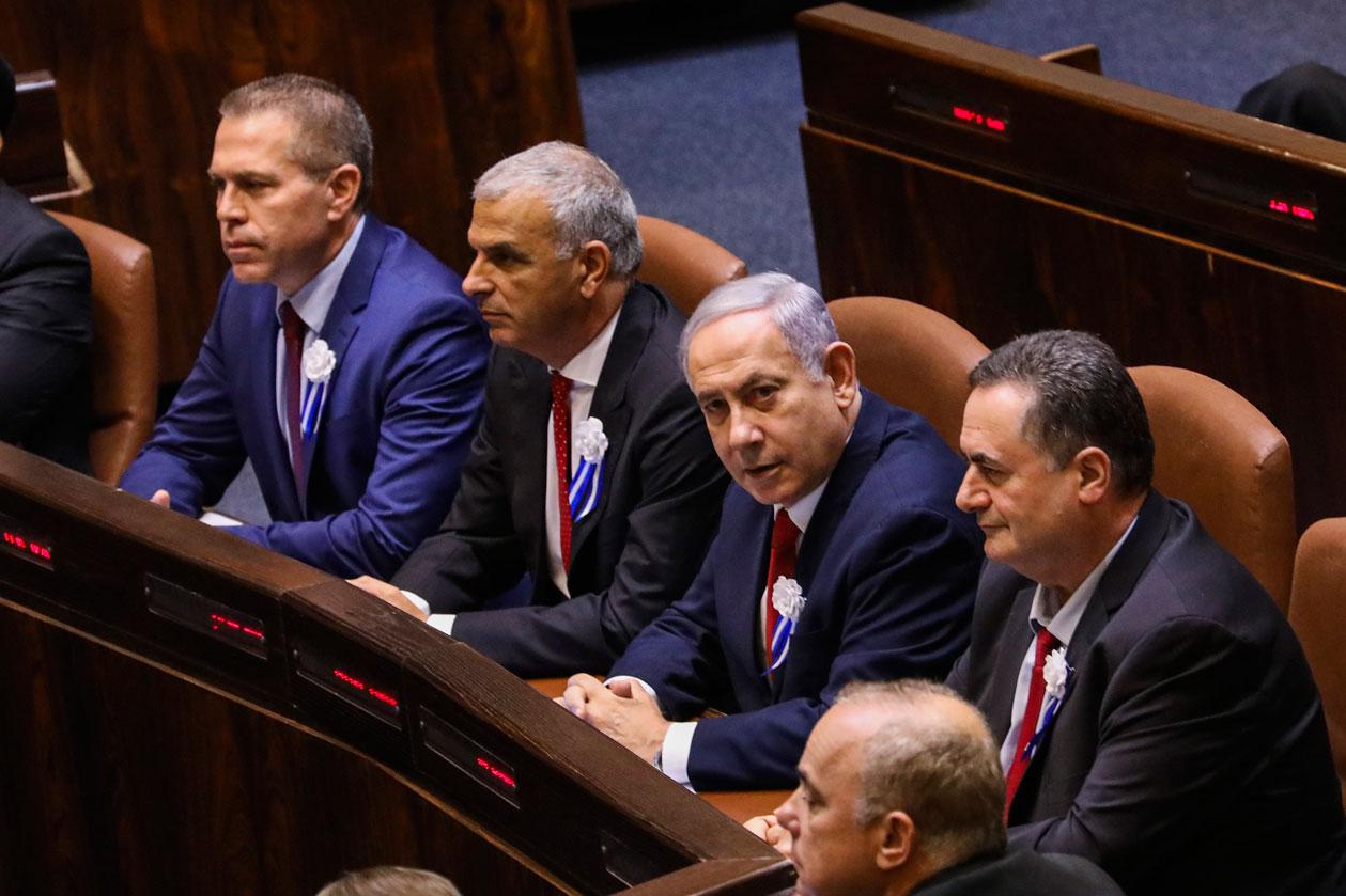Israeli Prime Minister Benjamin Netanyahu (2nd R) attends the first session of the 22nd Israeli parliament