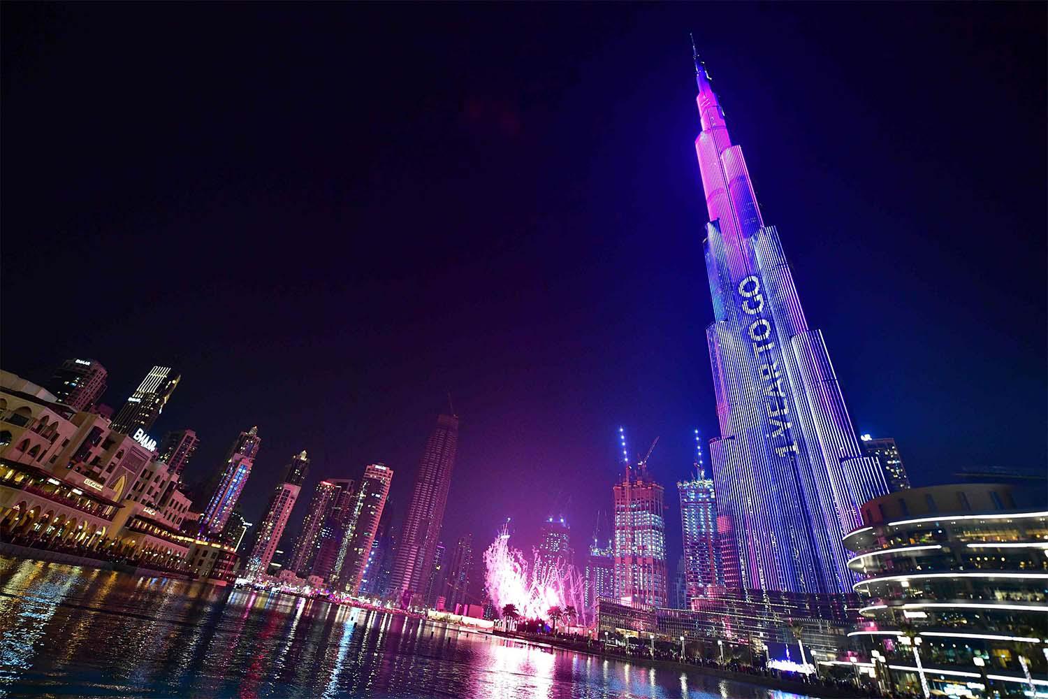 Dubai's Burj Khalifa, the world's tallest building is illuminated during festivities marking the one-year countdown to Expo 2020
