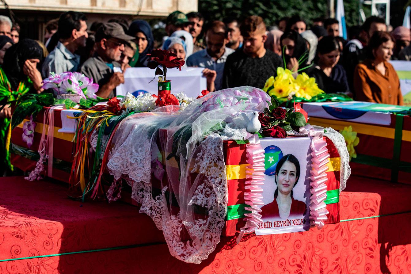 Mourners attend a funeral for Kurdish political leader Hevrin Khalaf and others including civilians and Kurdish fighters, in the northeastern town of al-Malikiyah/Derik