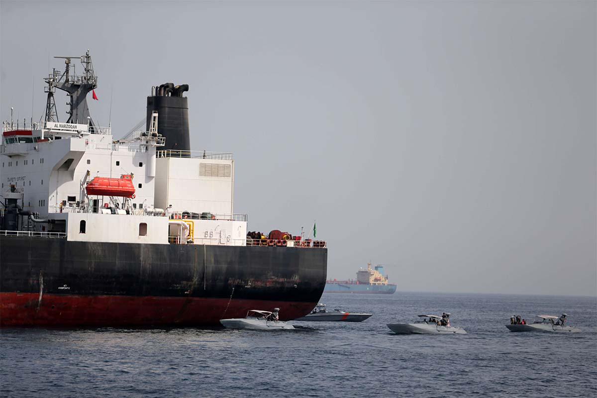 UAE Navy boats next to Al Marzoqah Saudi Arabia tanker attacked off the Port of Fujairah