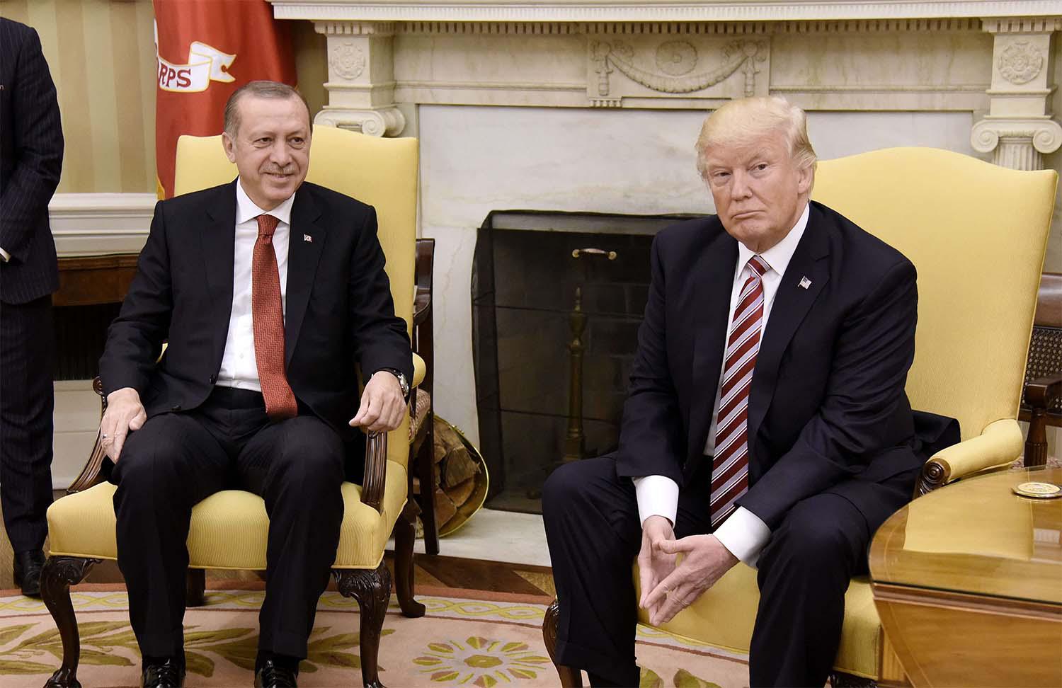 US President Donald Trump meets with President Recep Tayyip Erdogan of Turkey in the Oval Office of the White House in Washington, DC
