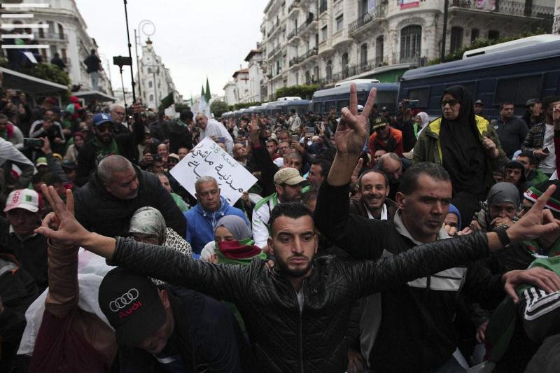 Demonstrators take to the streets in the capital Algiers to protest against the government