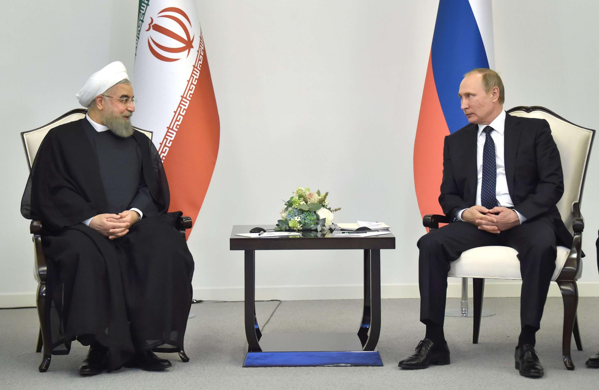 الرئيسان الروسي فلاديمير بوتين والإيراني حسن روحاني