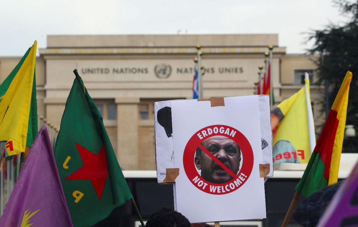 A placard depicting Turkey's President Recep Tayyip Erdogan is seen during a Kurds' demonstration in Geneva