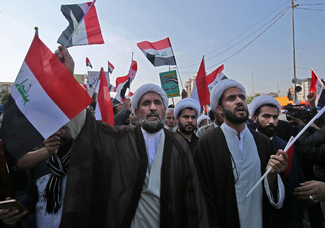 Supporters of the Hashed al-Shaabi armed network demonstrate in the capital Baghdad's Tahrir Square