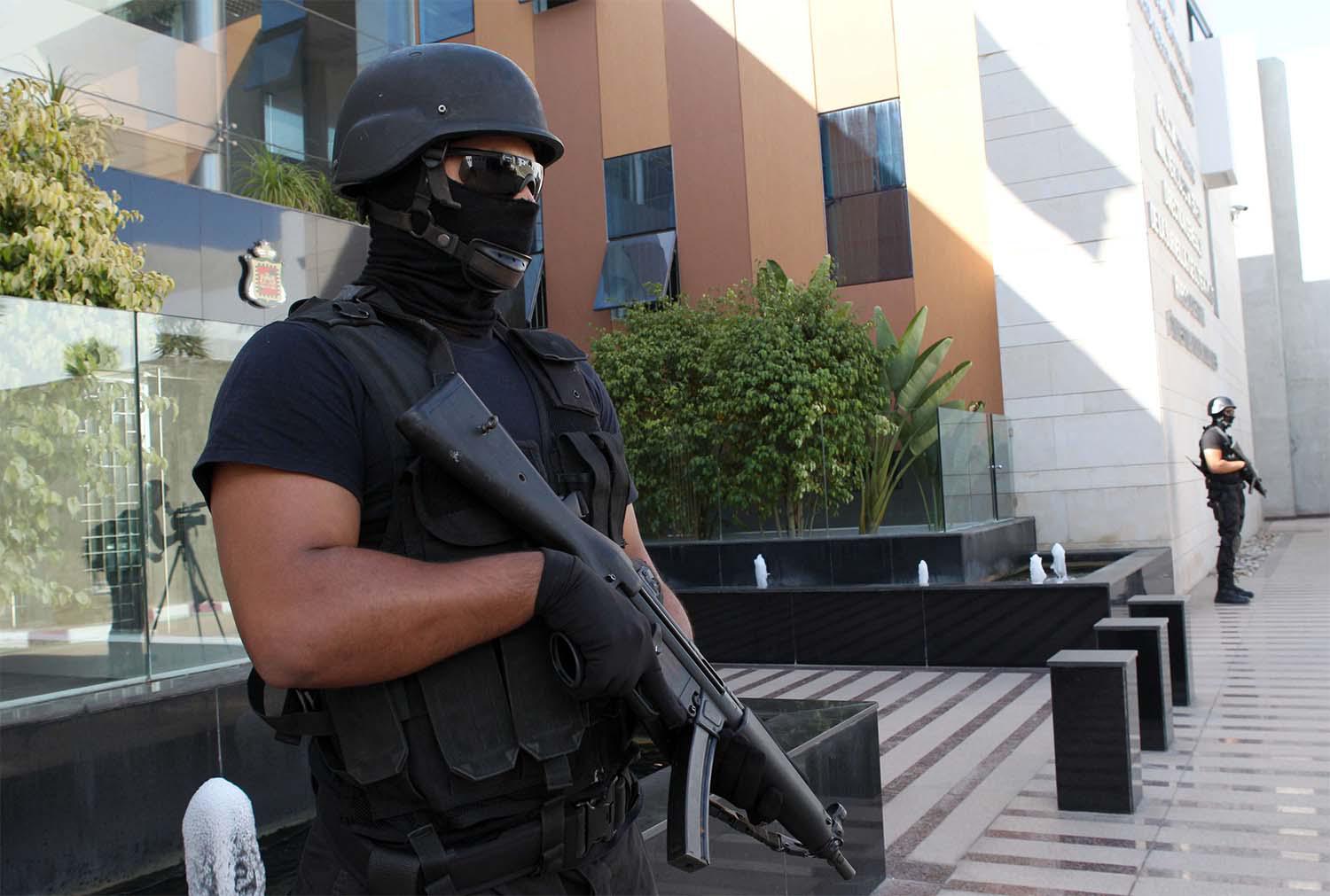 Members of the Moroccan special anti-terror unit guard the headquarters of the Central Bureau of Judicial Investigations in Sale near Rabat