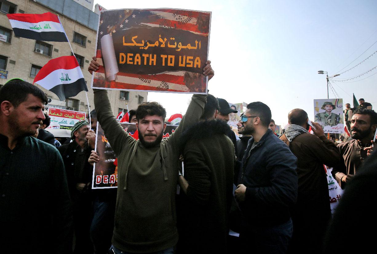 Iraqi supporters of the Hashed Al-shaabi armed network, demonstrate in the capital Baghdad's Tahrir Square