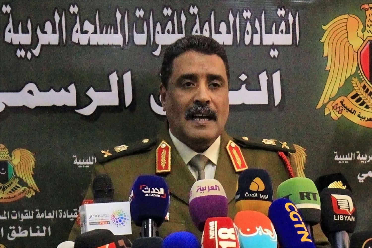 Ahmad al-Mesmari, spokesman for Haftar's forces, addresses the media in the eastern Libyan city of Benghazi
