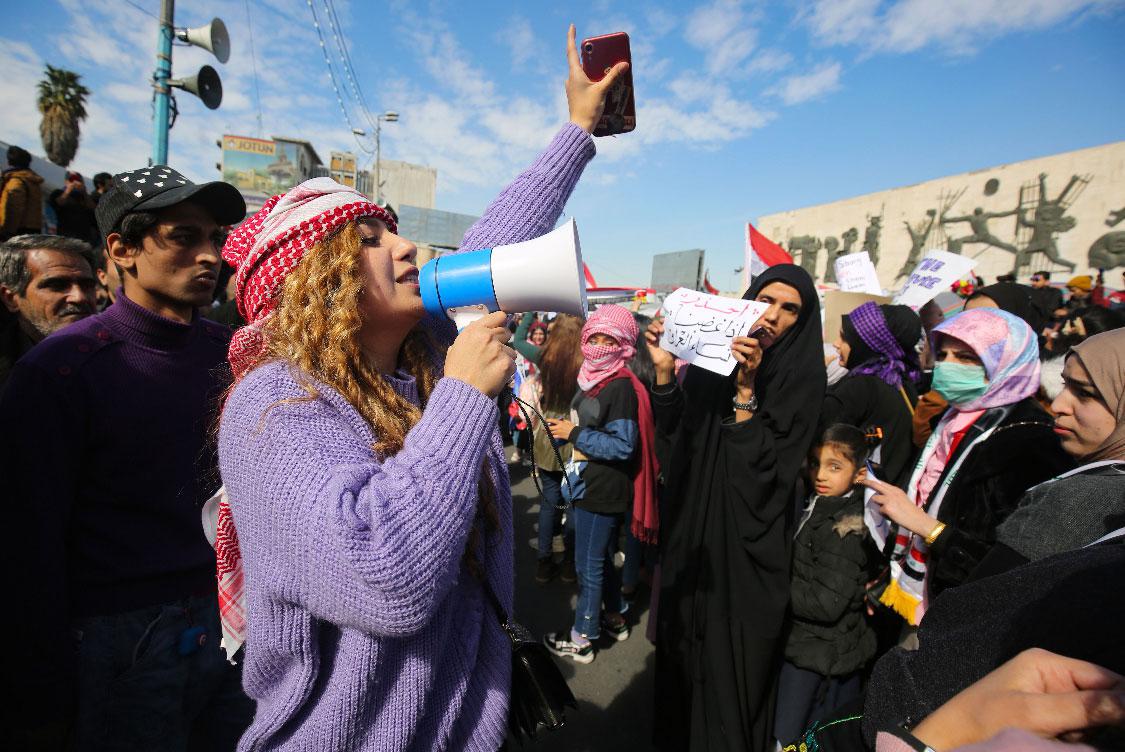 Iraqi women take to the streets in an anti-government demonstration in the capital's Tahrir Square