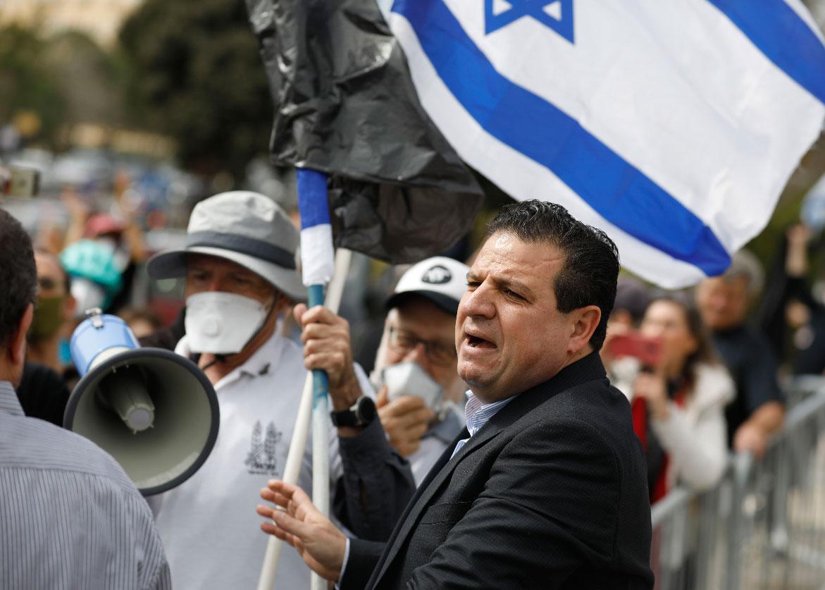 Arab-Israeli Ayman Odeh attends a protest outside the Knesset (parliament) in Jerusalem on March 23, 2020