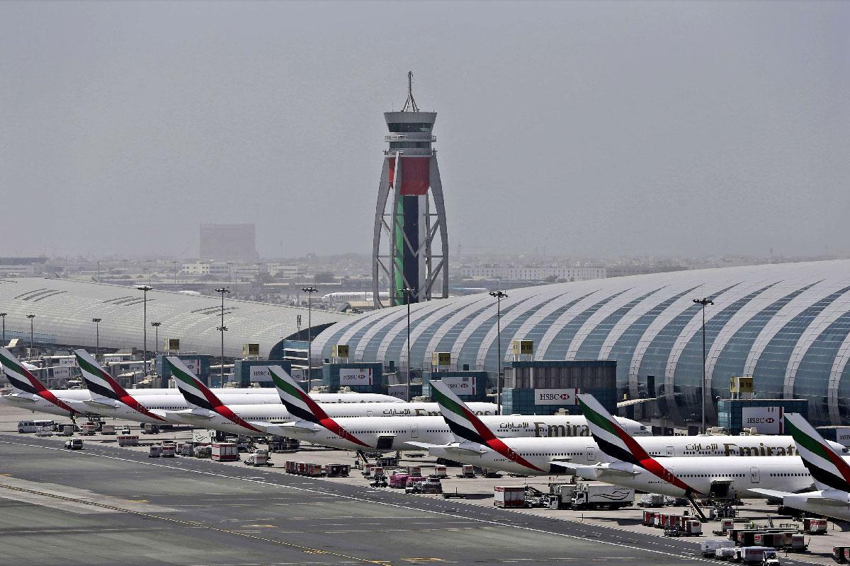 Emirates planes are parked at the Dubai International Airport in Dubai