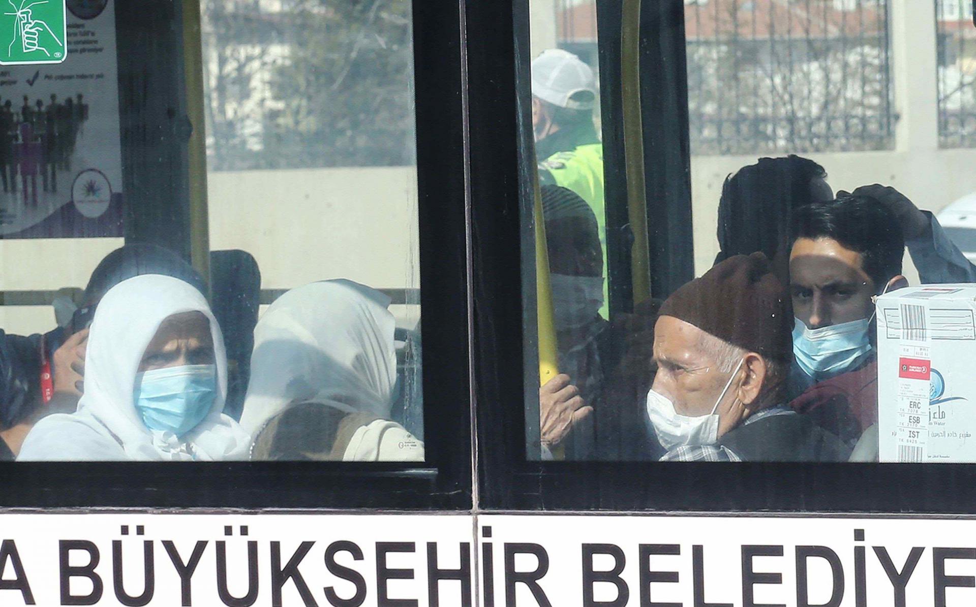 Turkish television showed pilgrims in Ankara wearing protective masks taken in buses to the dormitories.