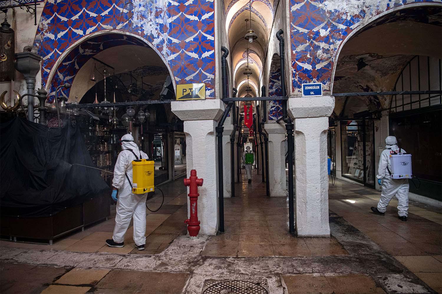Municipal workers disinfect the iconic Grand Bazaar in Istanbul to prevent the spread of the COVID-19
