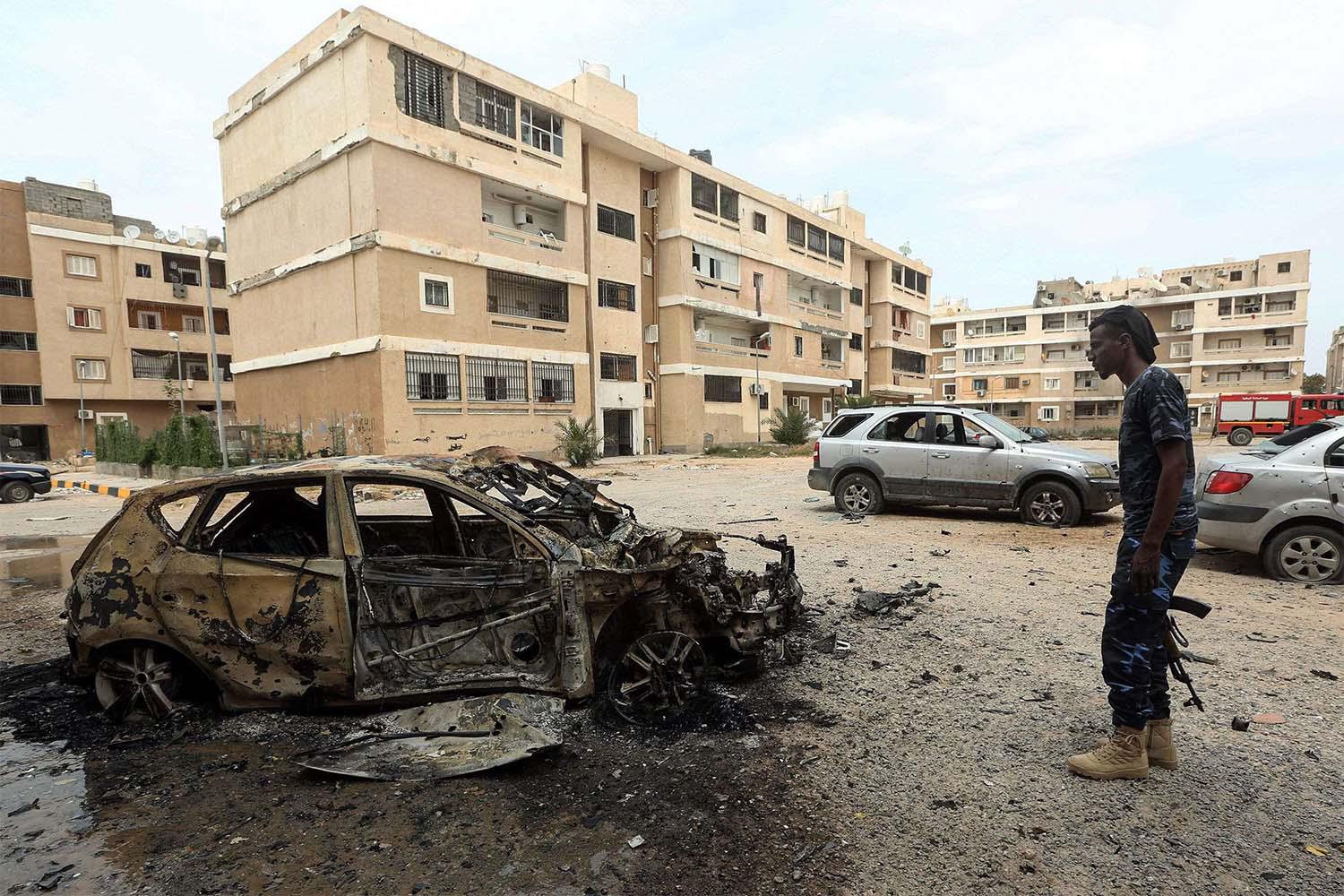 Destroyed car following bombardment in Tripoli