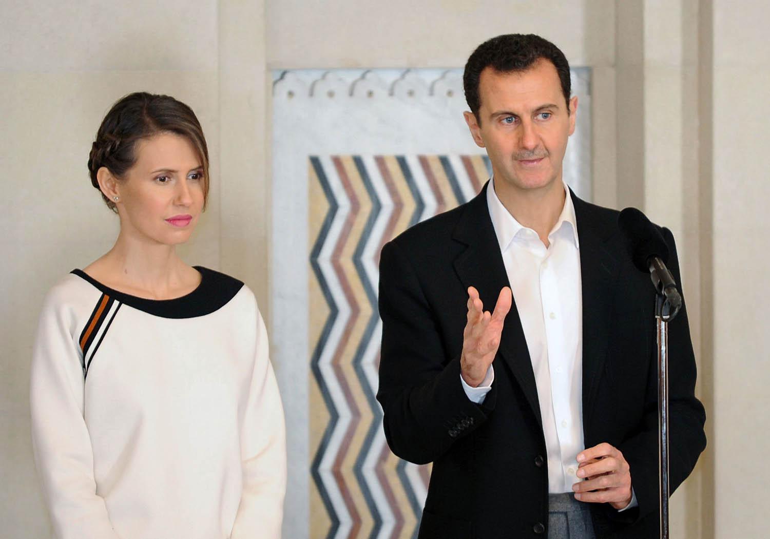 الرئيس السوري بشار الأسد مع زوجته أسماء