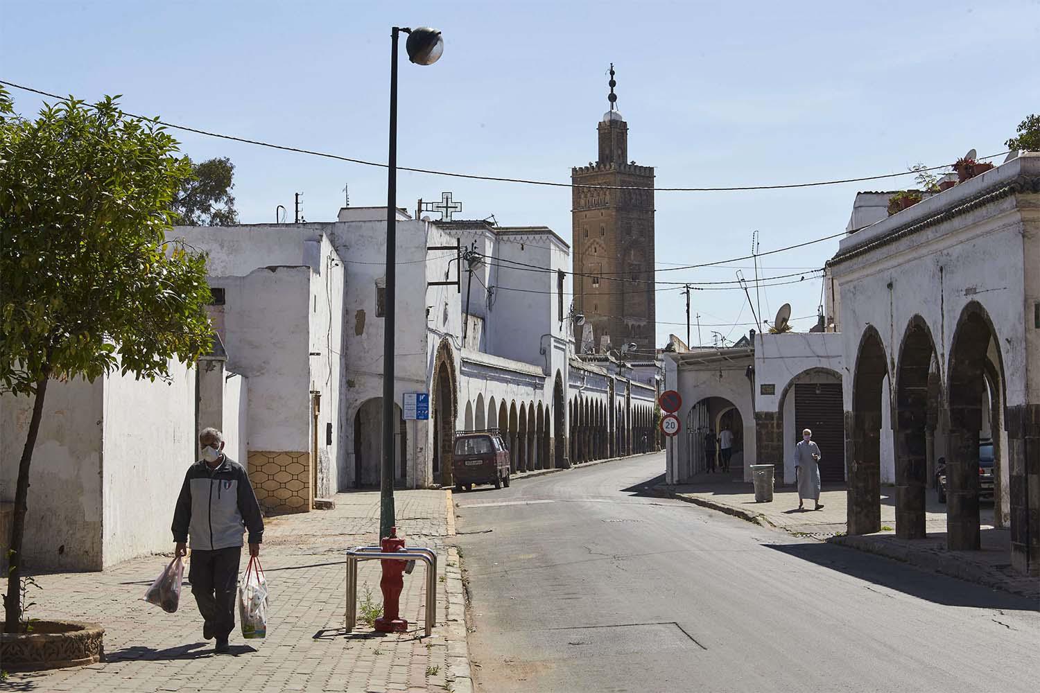 A man leaves one of the markets in the old Habous district of Casablanca