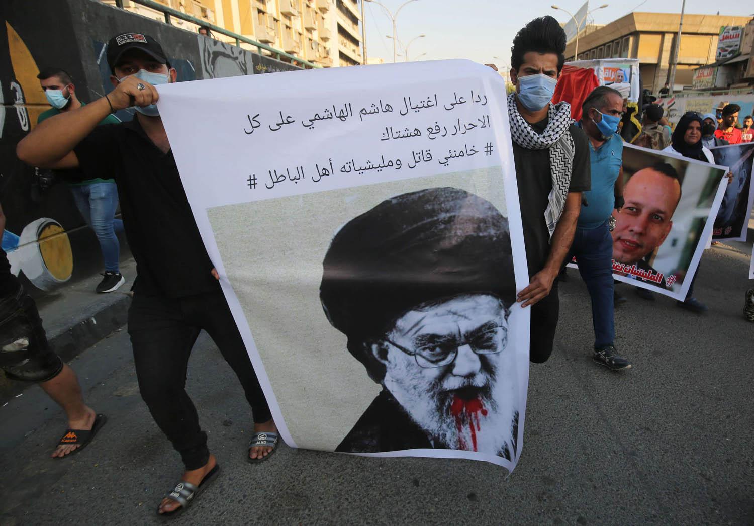 عراقيون يتظاهرون احتجاجا على اغتيال ناشط عراقي
