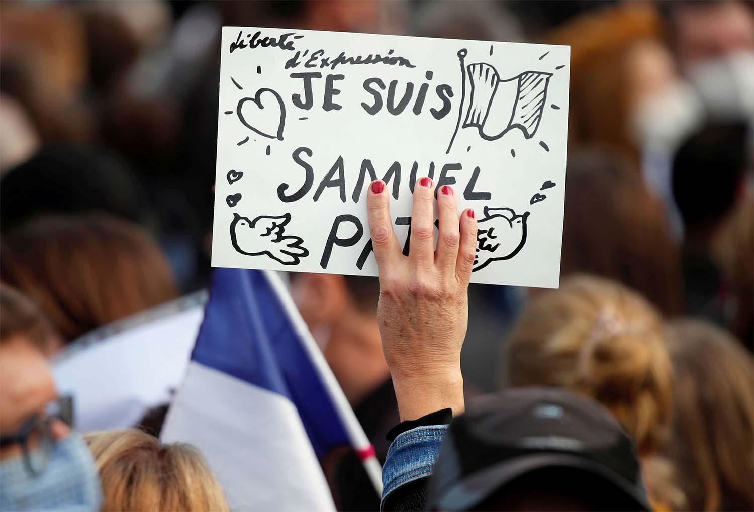 People gathered at the Place de la Republique in Paris, to pay tribute to Samuel Paty